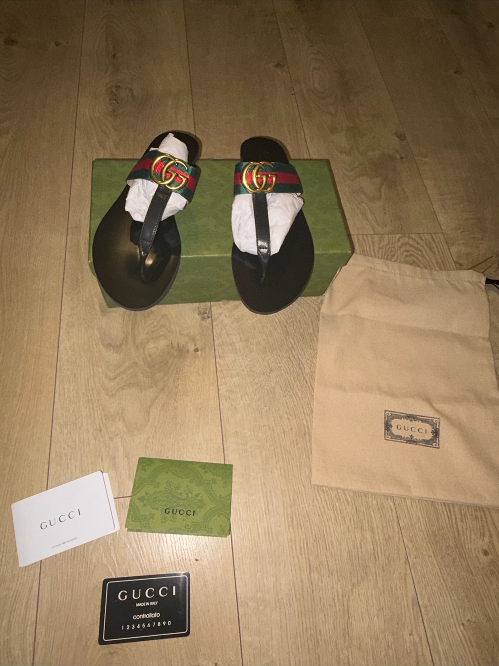 women’s Black Leather Thong Sandals with Signature Web Stripe